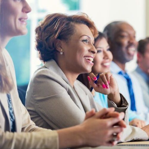 Diverse group of adult students in professional attire to represent how the Rosemont College Graduate Studies is a part of why Rosemont College is a Forbes Rated best online college and a best mainline college.