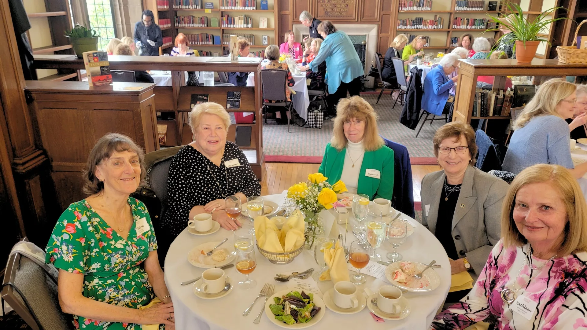 Group photo at an alumnae Golden Rose Mass & Luncheon event to represent how Rosemont College alumnae are part of why Rosemont College is a Forbes rated best online college, and a best Main Line college.