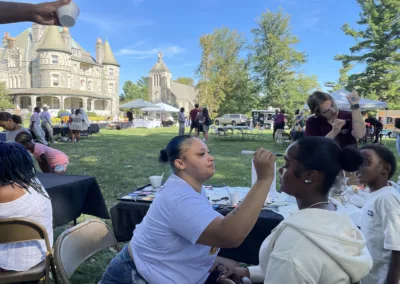 Oktoberfest 2025 face painting to represent how Rosemont College is a Forbes rated best online college, and a best Main Line college.