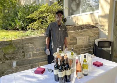 Dining Services table at the Alumni Exhibit during Reunion 2025 to represent how Rosemont College is a Forbes rated best online college, and a best Main Line college.