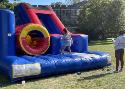 Oktoberfest 2025 bouncy house to represent how Rosemont College is a Forbes rated best online college, and a best Main Line college.