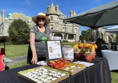 Oktoberfest 2025 Food Pantry table to represent how Rosemont College is a Forbes rated best online college, and a best Main Line college.