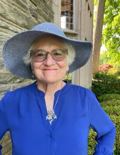 Alumna Linda Romanowski by the Gertrude Kistler Memorial Library is part of why Rosemont College is a Forbes rated best online college, and a best Main Line college.