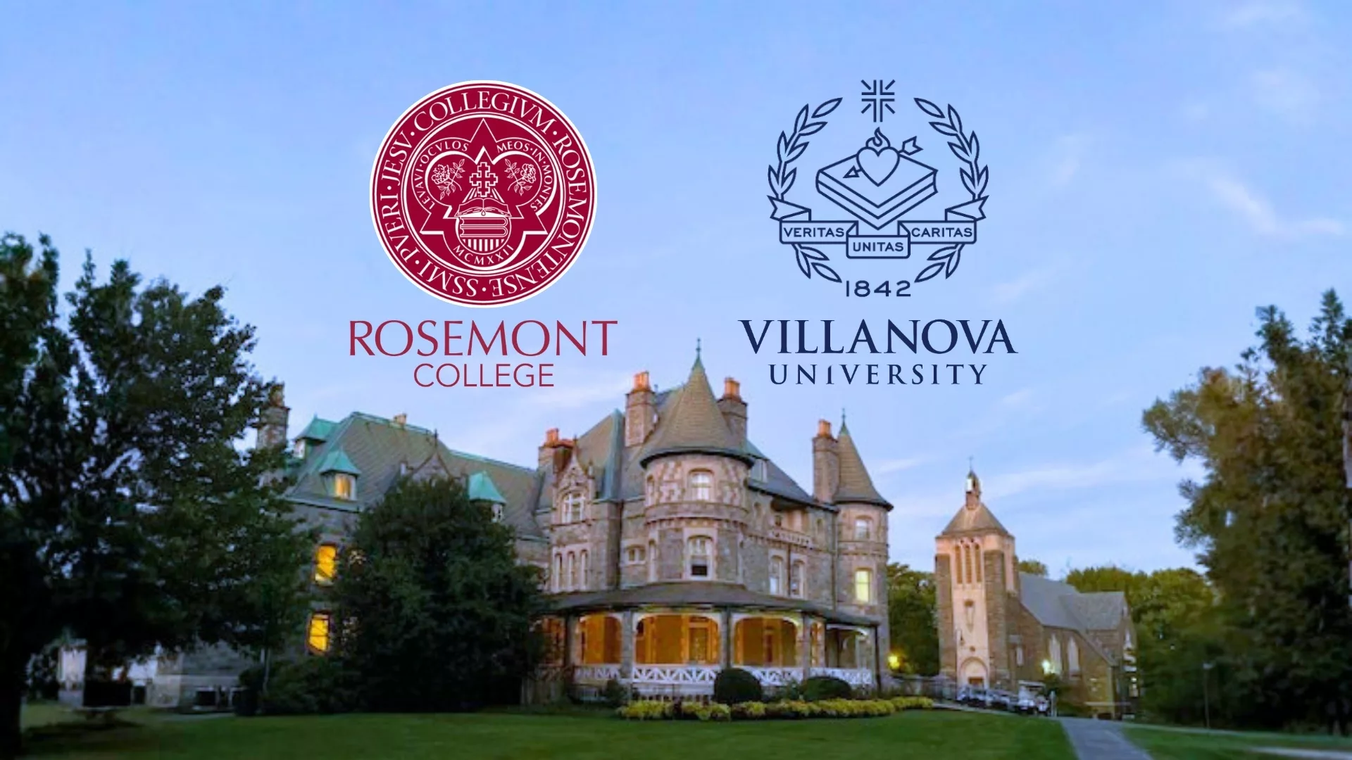 Rosemont College Villanova University Merger View of the Main Building (Rathalla) ast dusk with the Rosemont College seal and logo on one side of the roof peak and the Villanova University seal and logo on the other side to represent how the planned 2028 merger is part of the Rosemont College legacy to remain a best Main Line college.