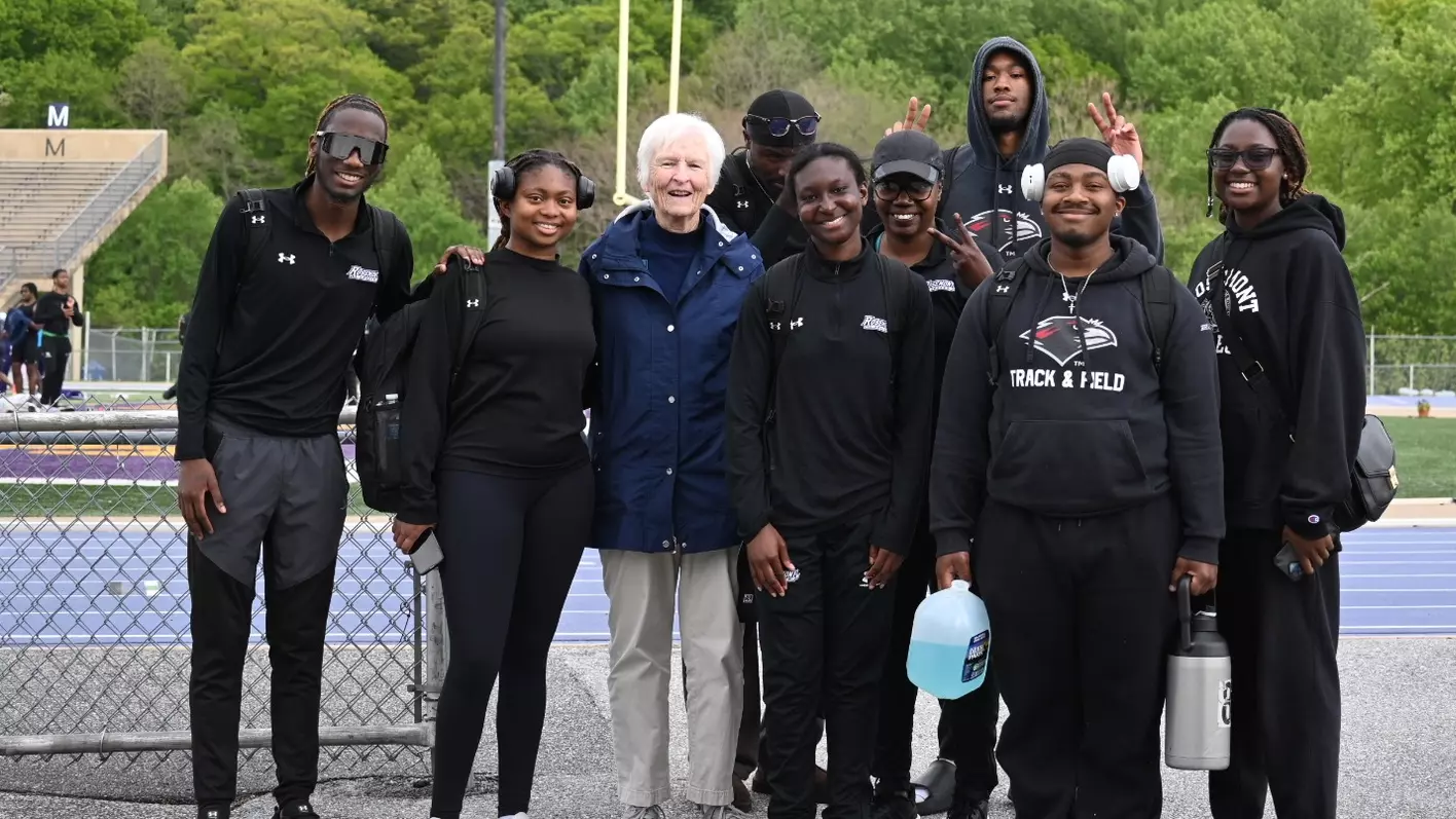 VP of Mission & Ministry Sister Peg Doyle and the 2026 Track & Field team to represent how Rosemont College is a Forbes rated best online college, and a best Main Line college.