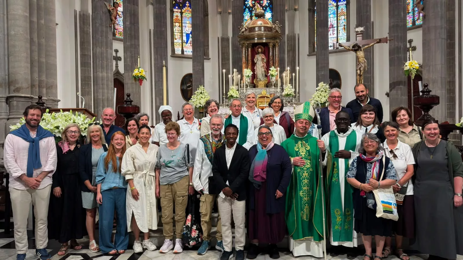 Dr. Christine Hagedorn with attendees in a church at the 2026 Canary Islands global symposium is part of why Rosemont College is a Forbes rated best online college, and a best Main Line college.